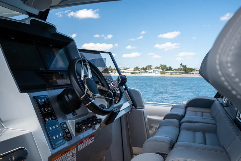 Slide: The Image of Interior view of 2022 Novamarine BS 160 Outboard boat with steering wheel and seating. - 30