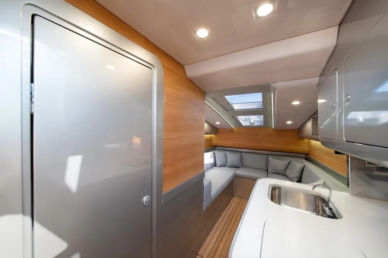 Slide: The Image of Luxurious interior of 2022 Novamarine BS 160 Outboard with modern seating and kitchenette. - 35