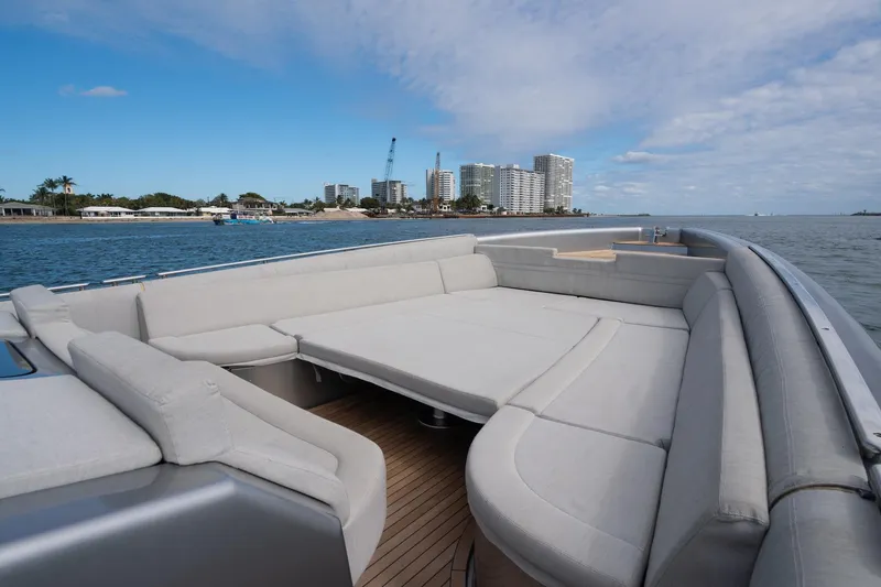 Slide: The Image of Luxurious 2022 Novamarine BS 160 Outboard boat with spacious seating, cruising near a coastal cityscape. - 43