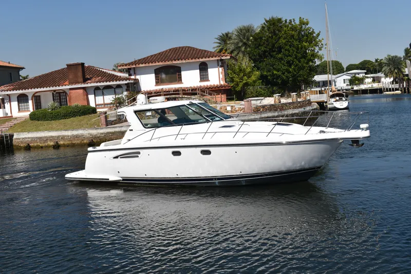 The Image of 2006 Tiara Yachts 3600 Open cruising near waterfront homes. - 0