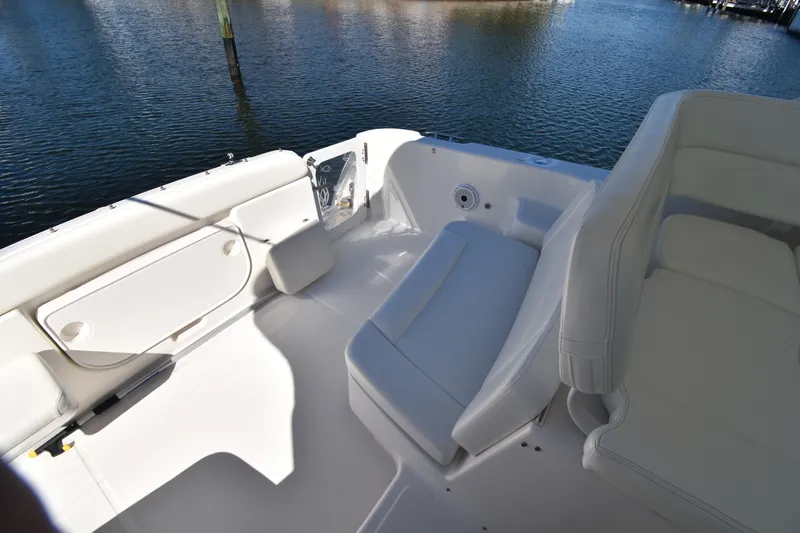 Slide: The Image of 2006 Tiara Yachts 3600 Open cockpit with white seating and water view. - 13