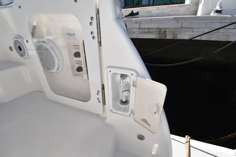 Slide: The Image of 2006 Tiara Yachts 3600 Open deck with speaker and utility compartment. - 15