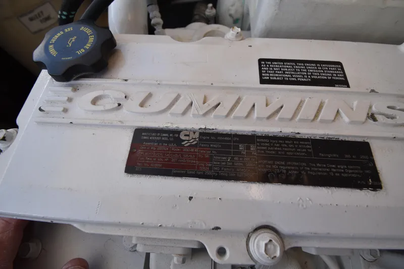 Slide: The Image of Cummins engine in a 2006 Tiara Yachts 3600 Open, featuring diesel oil cap. - 30