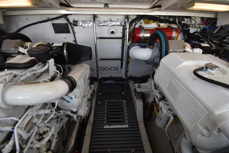 Slide: The Image of Engine room of 2006 Tiara Yachts 3600 Open, showcasing dual engines and mechanical components. - 31