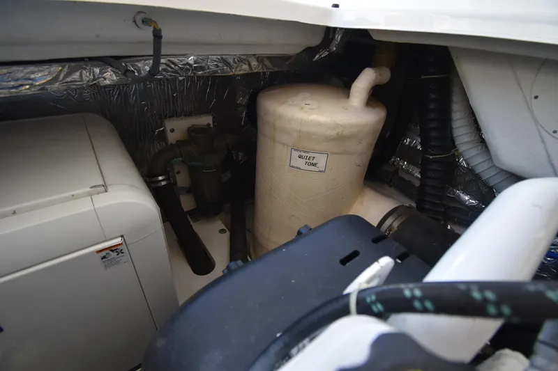 Slide: The Image of Engine room of 2006 Tiara Yachts 3600 Open, featuring equipment and piping. - 33
