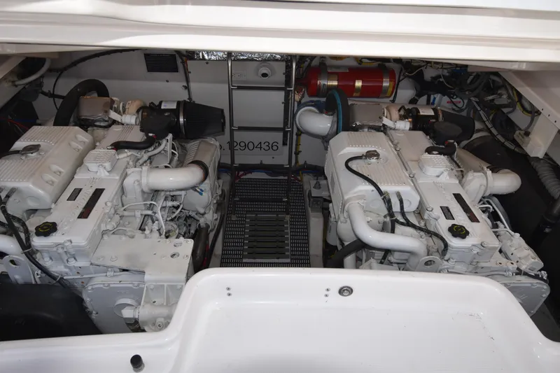 Slide: The Image of Engine room of 2006 Tiara Yachts 3600 Open, featuring dual engines and equipment. - 34