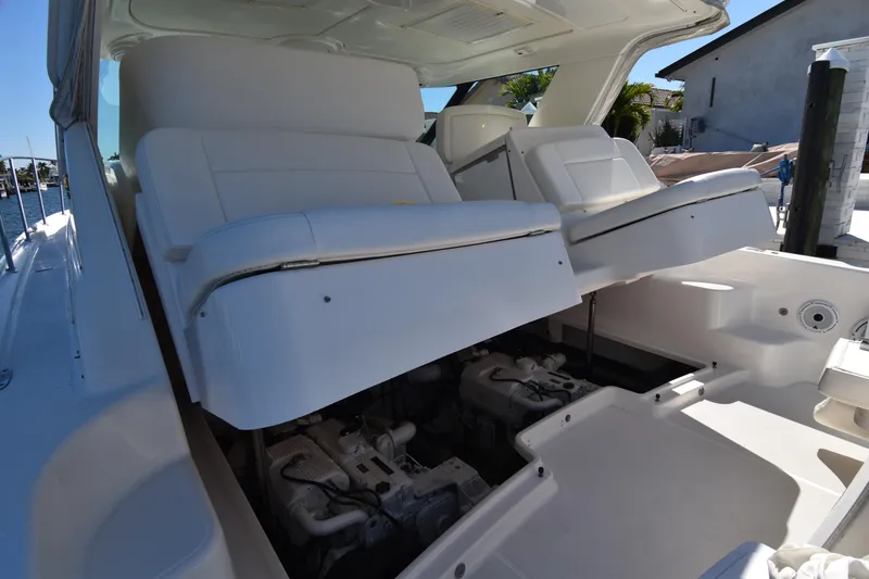 Slide: The Image of 2006 Tiara Yachts 3600 Open with raised seating, revealing engine compartment. - 35