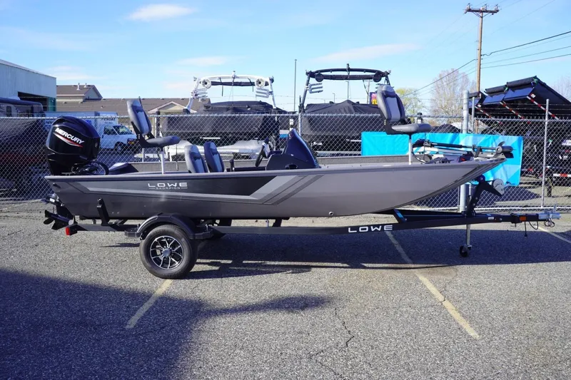 The Image of 2025 Lowe Skorpion 17 fishing boat on trailer, parked outdoors. - 0