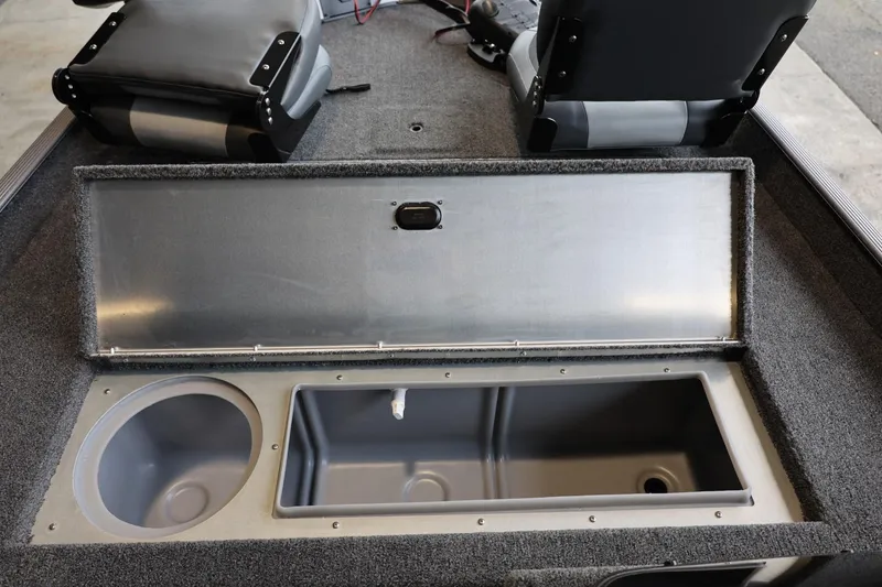 Slide: The Image of 2025 Lowe Skorpion 17 boat interior storage compartments with seating. - 19