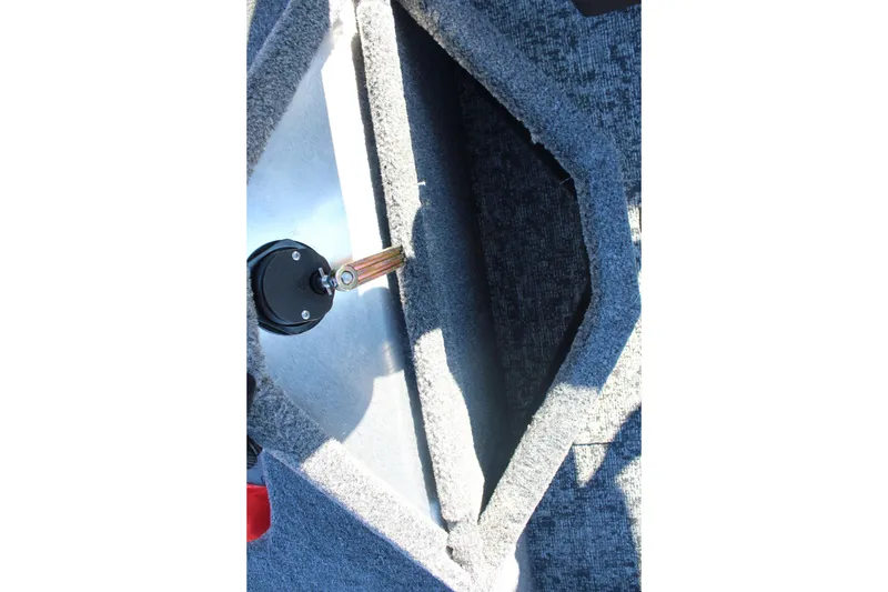 Slide: The Image of 2026 Tracker Pro Guide V-16 SC boat interior storage compartment. - 16