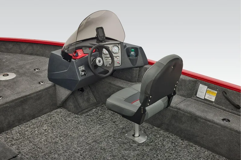 Slide: The Image of Manufacturer Provided Image: 2026 Tracker Pro Guide V-16 SC boat interior with steering console and seating. - 39