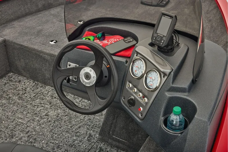 Slide: The Image of Manufacturer Provided Image: 2026 Tracker Pro Guide V-16 SC boat dashboard with steering wheel and gauges. - 41