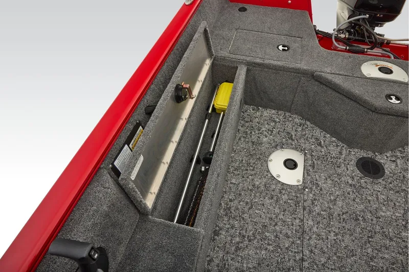 Slide: The Image of Manufacturer Provided Image: 2026 Tracker Pro Guide V-16 SC boat interior with storage compartments and carpeted flooring. - 48