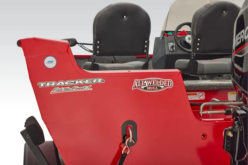Slide: The Image of Manufacturer Provided Image: 2026 Tracker Pro Guide V-16 SC boat, red all-welded hull, interior seating visible. - 56