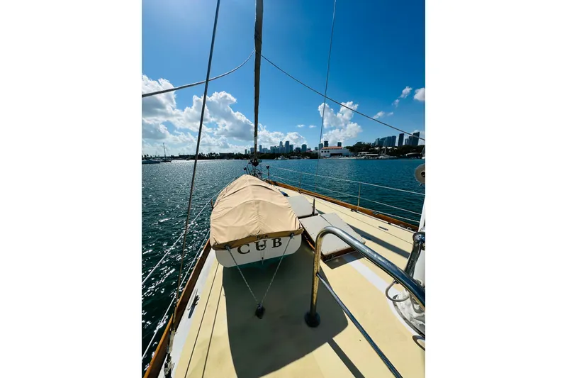 Slide: The Image of Sailboat deck view of 1971 Alden Boothbay Explorer under clear blue sky. - 11
