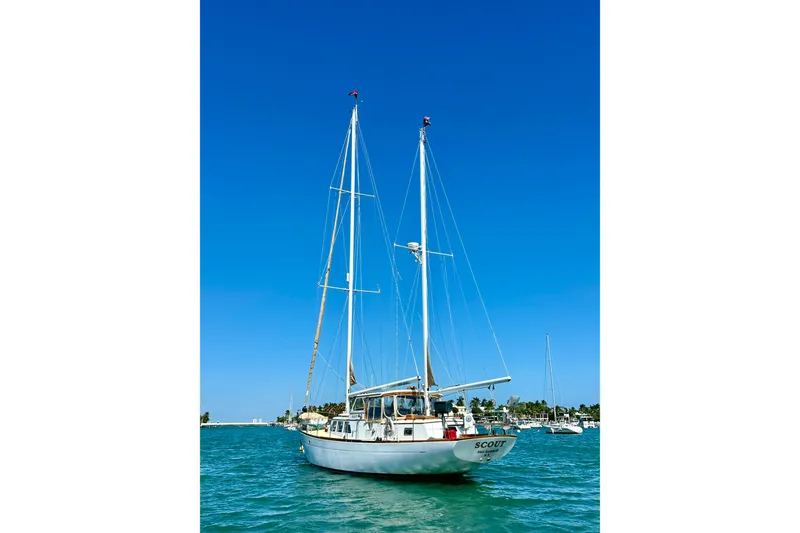 Slide: The Image of 1971 Alden Boothbay Explorer sailboat on blue ocean under clear sky. - 26
