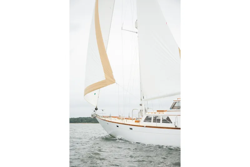 Slide: The Image of Sailing yacht Alden Boothbay Explorer 1971 on open water, white sails unfurled. - 33