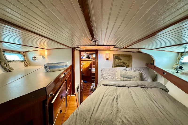 Slide: The Image of Cozy cabin interior of 1971 Alden Boothbay Explorer yacht with bed and wooden furnishings. - 38