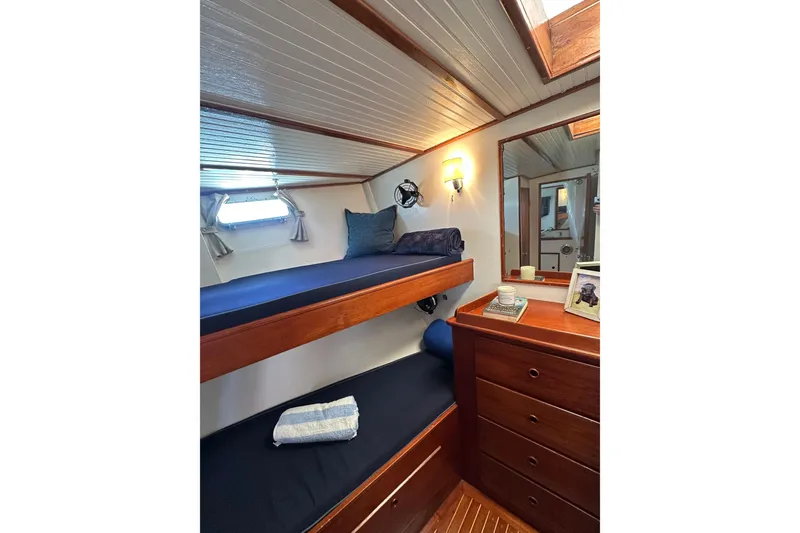 Slide: The Image of Interior of 1971 Alden Boothbay Explorer yacht with wooden bunk beds and dresser. - 40