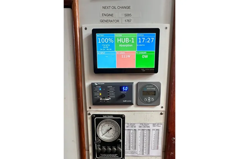 Slide: The Image of Control panel of a 1971 Alden Boothbay Explorer with battery and system status displays. - 53