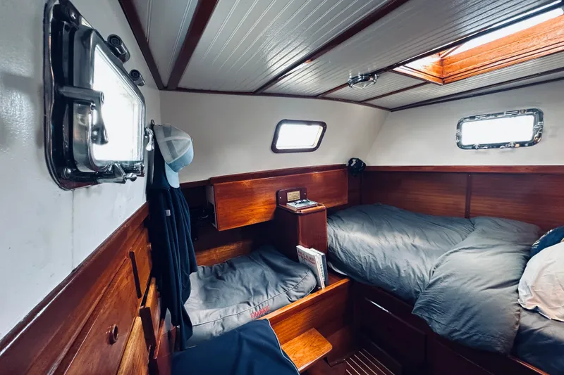 Slide: The Image of Interior of 1971 Alden Boothbay Explorer yacht with cozy wooden cabin and twin beds. - 59