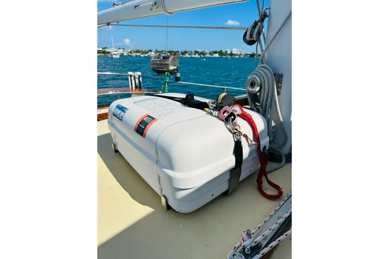 Slide: The Image of 1971 Alden Boothbay Explorer sailboat deck with safety equipment, ocean view in background. - 66