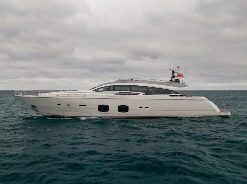 Slide: The Image of 2018 Pershing 108 yacht cruising on open sea under cloudy skies. - 3
