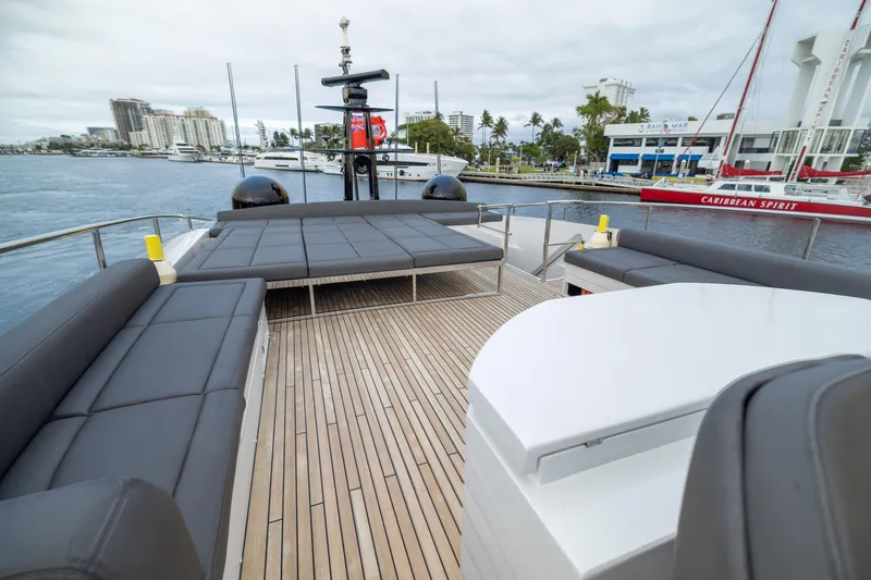 Slide: The Image of Luxurious 2018 Pershing 108 yacht deck with sleek seating and waterfront view. - 30
