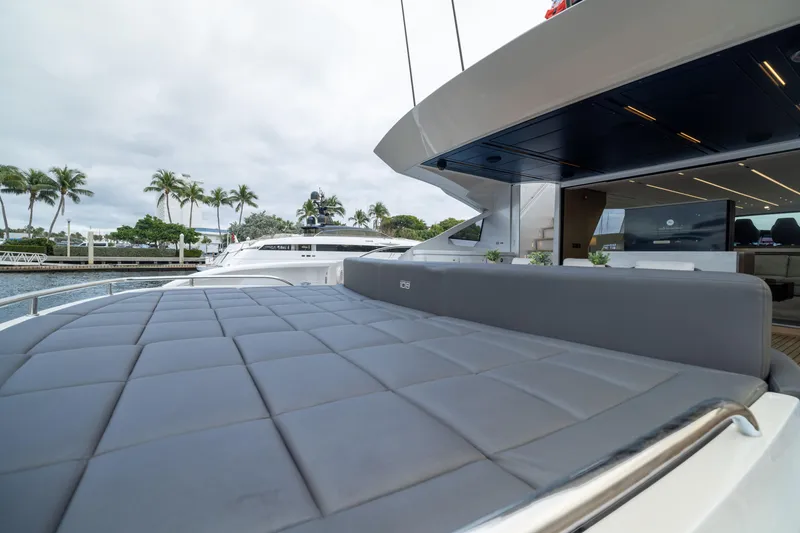 Slide: The Image of 2018 Pershing 108 yacht with sleek design, spacious deck, and luxurious amenities. - 38