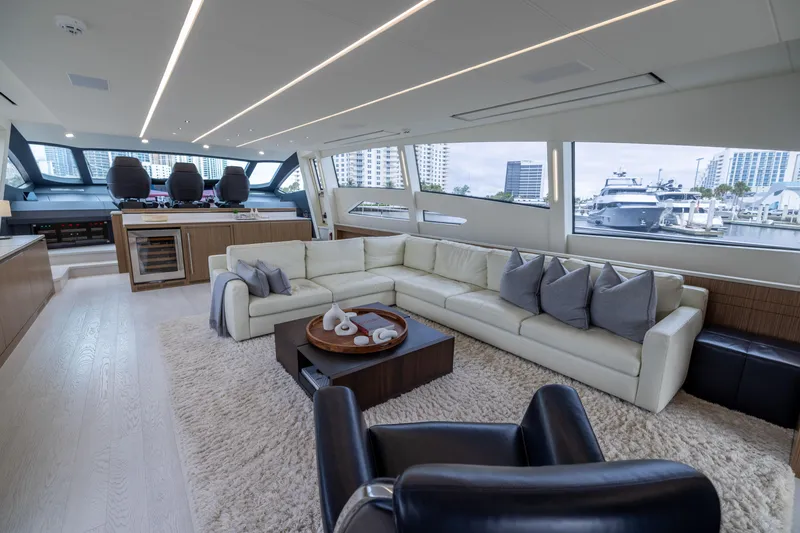 Slide: The Image of Luxurious interior of 2018 Pershing 108 yacht with modern seating and large windows. - 39