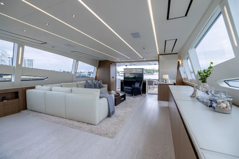Slide: The Image of Luxurious interior of a 2018 Pershing 108 yacht with modern furnishings and panoramic windows. - 41