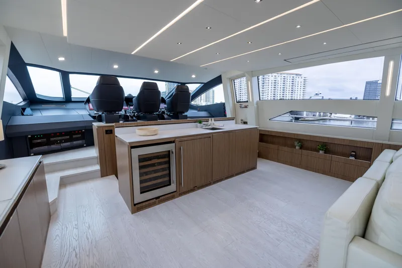 Slide: The Image of Luxurious interior of 2018 Pershing 108 yacht with modern helm and sleek design. - 43