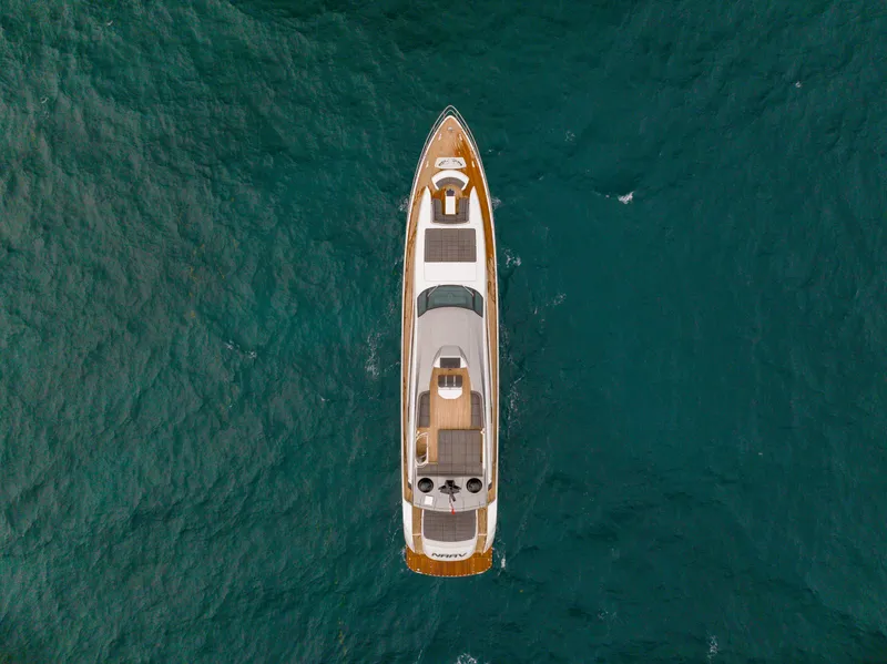 Slide: The Image of Overhead view of 2018 Pershing 108 yacht on open sea. - 7