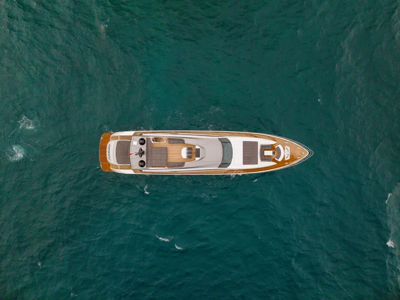 Slide: The Image of Aerial view of 2018 Pershing 108 yacht cruising in open sea. - 8