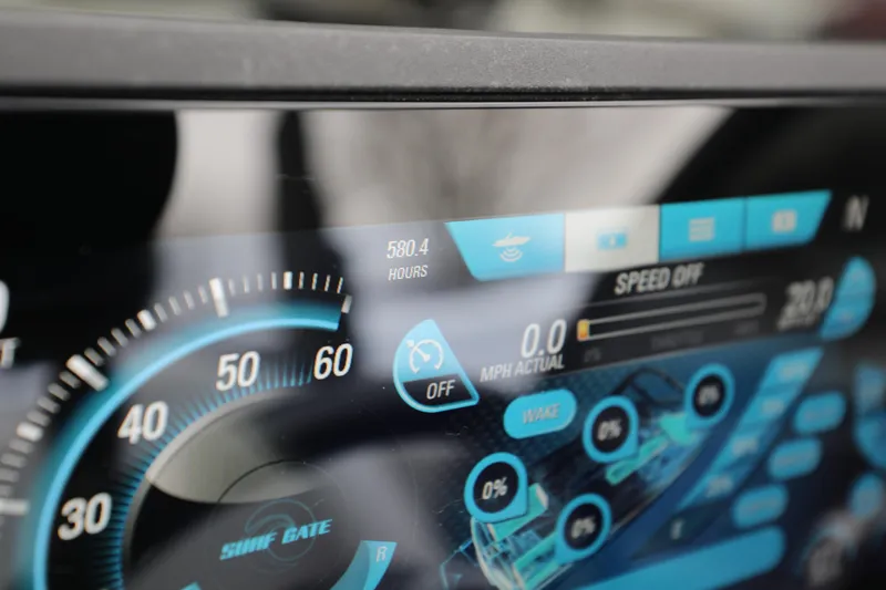 Slide: The Image of Dashboard of 2017 Malibu Wakesetter 22 MXZ showing speed and settings. - 10