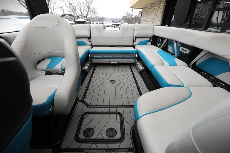 Slide: The Image of 2017 Malibu Wakesetter 22 MXZ interior with spacious seating and modern design. - 3