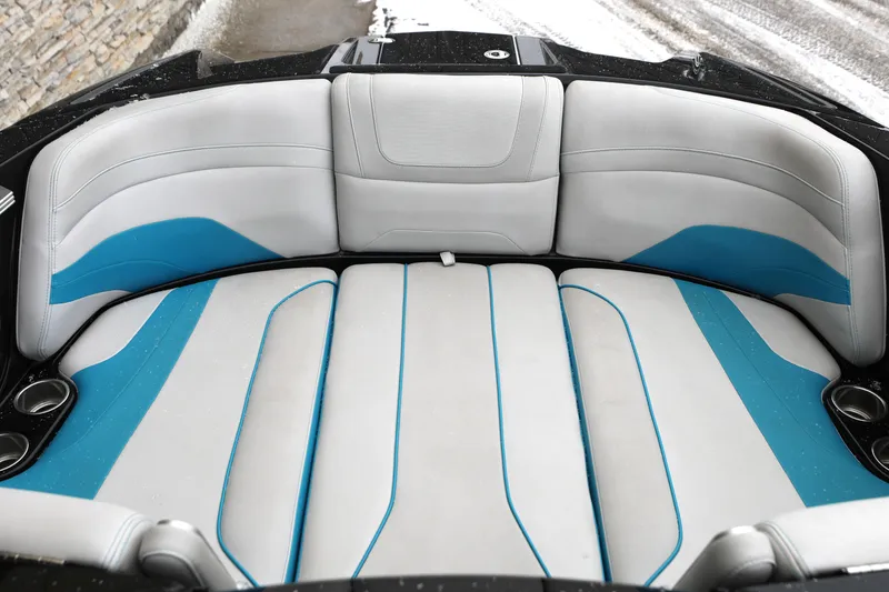 Slide: The Image of 2017 Malibu Wakesetter 22 MXZ interior with white and blue seating. - 4