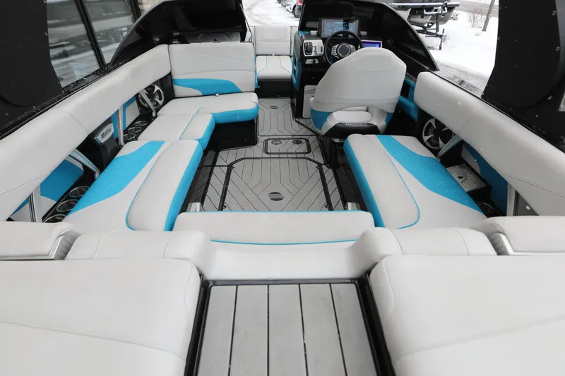 Slide: The Image of 2017 Malibu Wakesetter 22 MXZ interior with spacious seating and modern dashboard. - 5