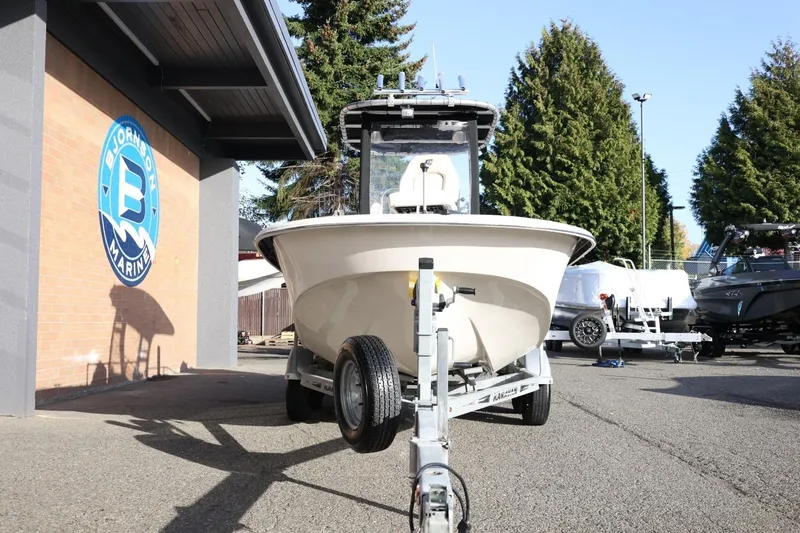 Slide: The Image of 2013 Carolina Skiff 178 DLV boat on trailer at Bjornson Marine dealership. - 12
