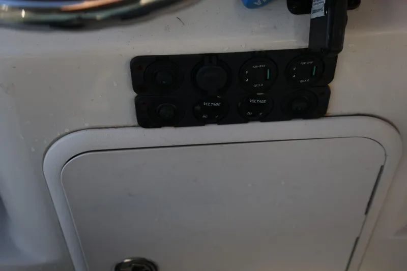 Slide: The Image of Control panel on a 2013 Carolina Skiff 178 DLV boat dashboard. - 23