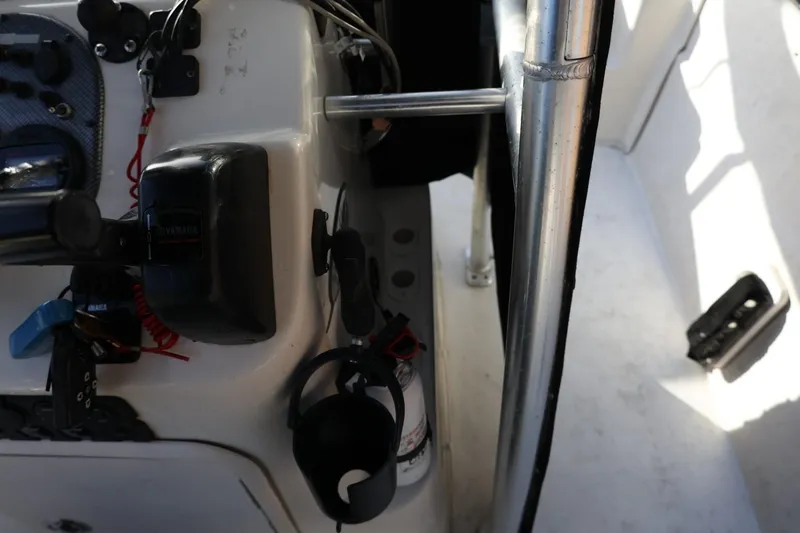Slide: The Image of 2013 Carolina Skiff 178 DLV boat console with controls and accessories. - 24