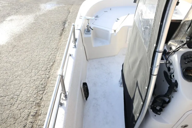 Slide: The Image of 2013 Carolina Skiff 178 DLV boat interior with railing and console details. - 28