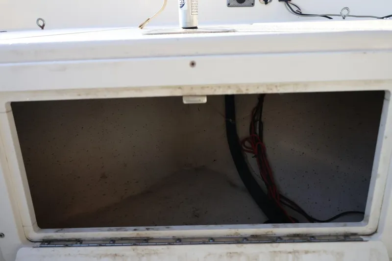 Slide: The Image of Open storage compartment in 2013 Carolina Skiff 178 DLV boat. - 34