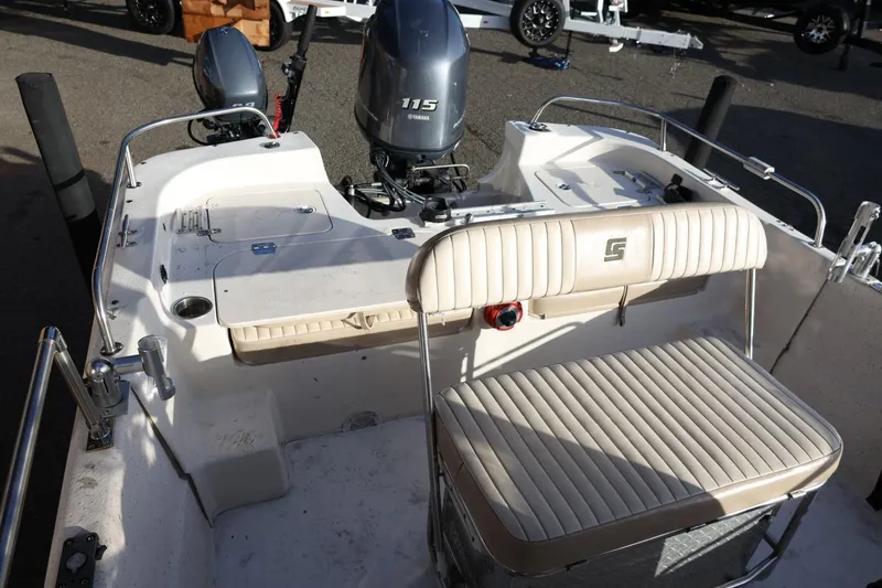 Slide: The Image of 2013 Carolina Skiff 178 DLV boat interior with Yamaha 115 engine and seating. - 37