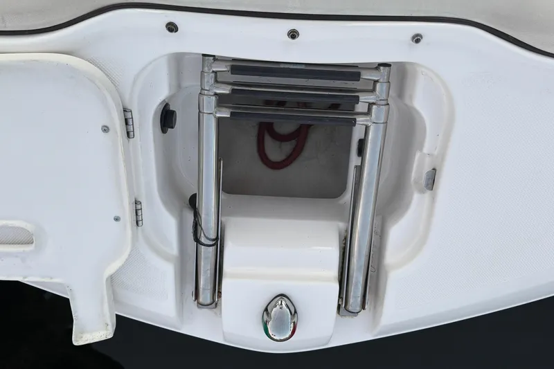 Slide: The Image of Foldable ladder on a 2016 Regal 23 OBX boat, integrated into the deck. - 19