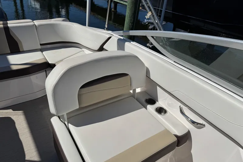 Slide: The Image of 2016 Regal 23 OBX boat docked at marina during sunset. - 6