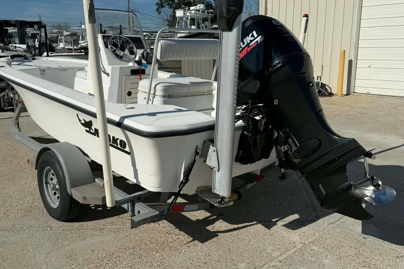 Slide: The Image of 2007 Mako 1801 Inshore boat with Suzuki outboard motor on trailer. - 4