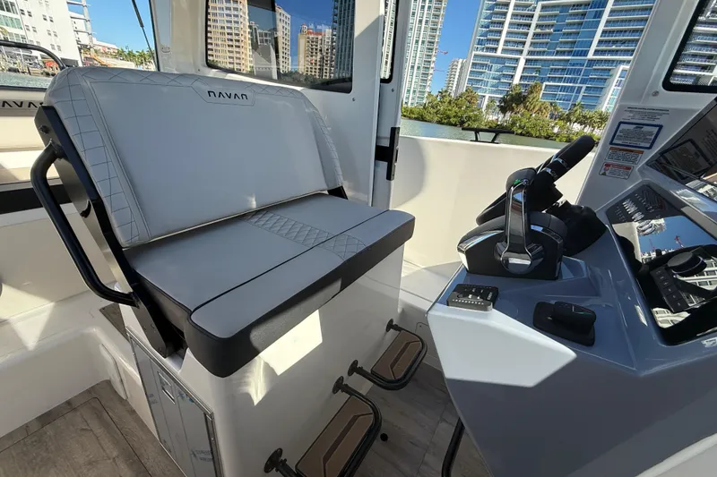 Slide: The Image of Interior of 2026 Navan C30 boat with modern controls and seating. - 22