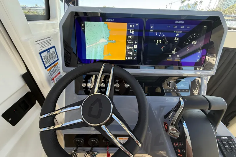 Slide: The Image of Steering console of 2026 Navan C30 boat with advanced navigation displays. - 24