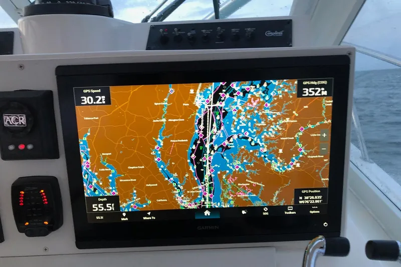 Slide: The Image of GPS navigation screen on a 2007 Carolina Classic 35 Express boat. - 9